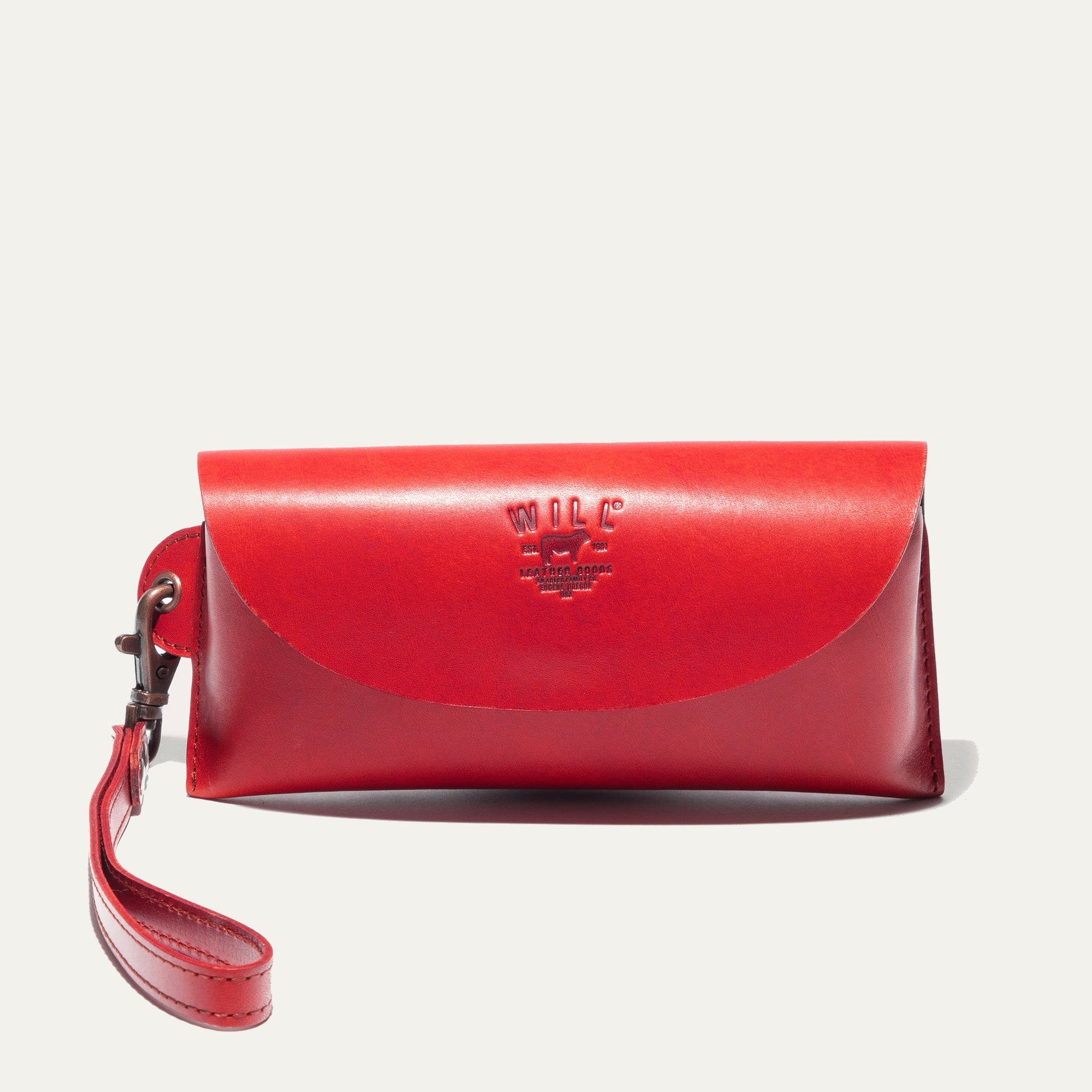 Eyeglass case by Will Leather Goods, red leather with embossed logo and strap on Tampa Home & Garden Store