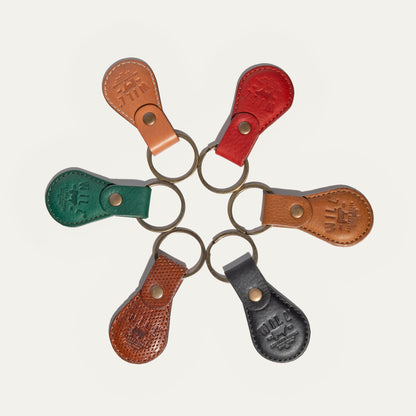 Logo keychains by Will Leather Goods, set of 8 in assorted leather colors with brass rings on Tampa Home & Garden Store