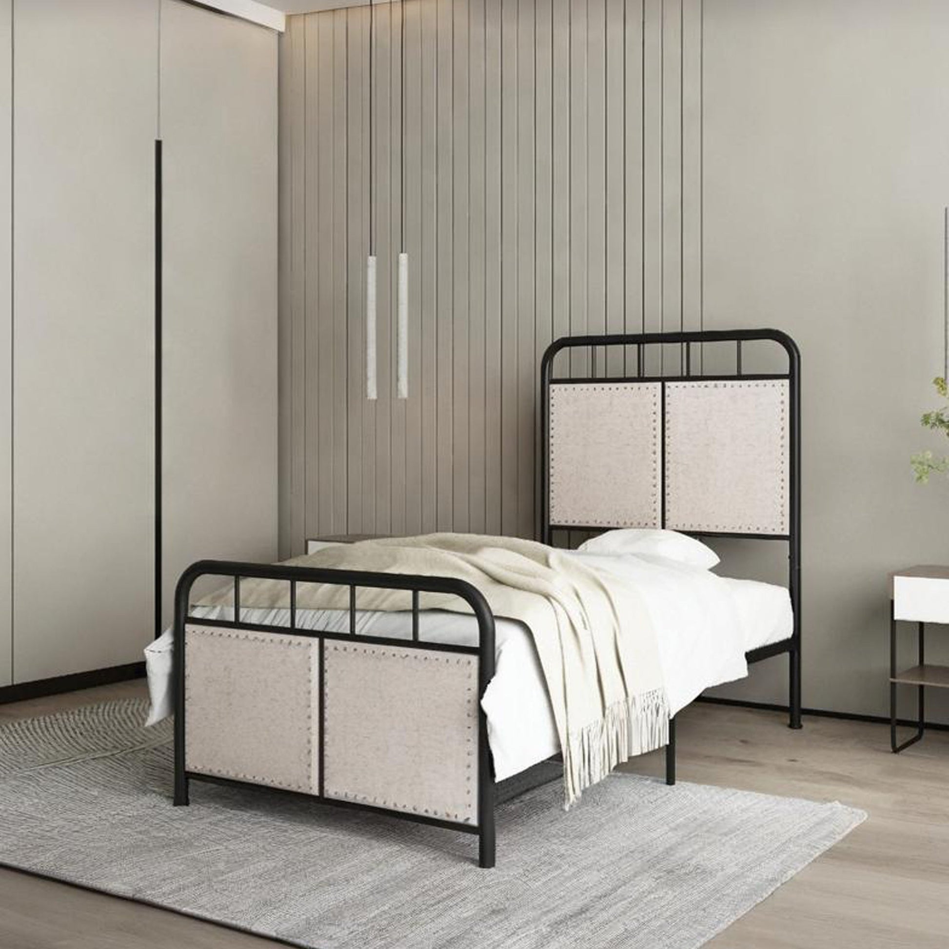 Twin size linen upholstered platform bed with black metal frame and beige fabric headboard and footboard on Tampa Home & Garden Store