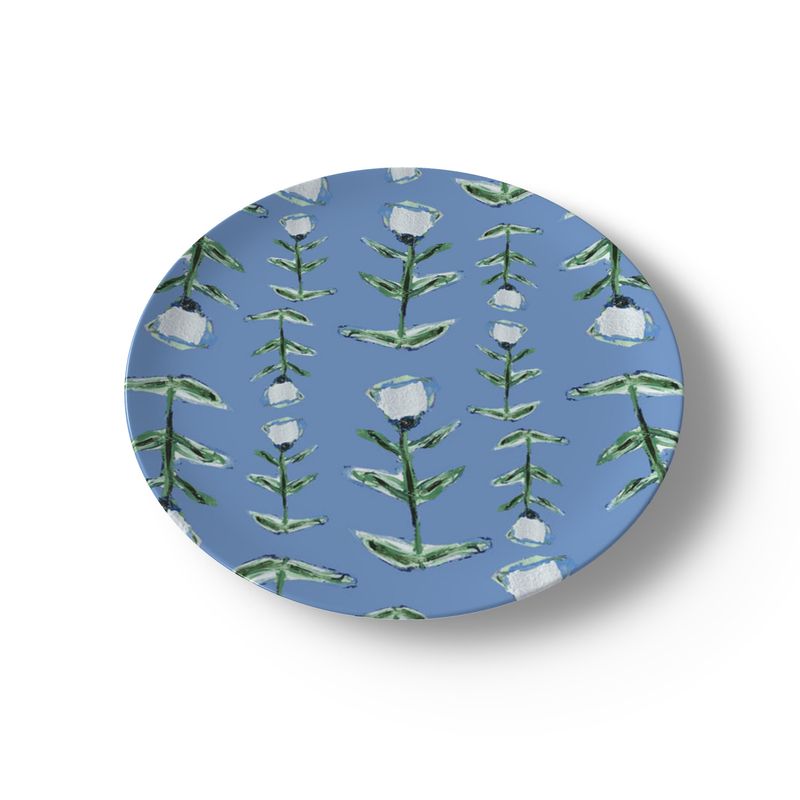 Blue tulip bone china plate with repeating green stems and white blossoms on blue background on Tampa Home & Garden Store