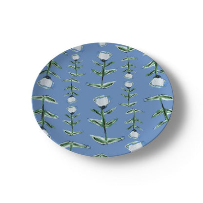 Blue tulip bone china plate with repeating green stems and white blossoms on blue background on Tampa Home & Garden Store