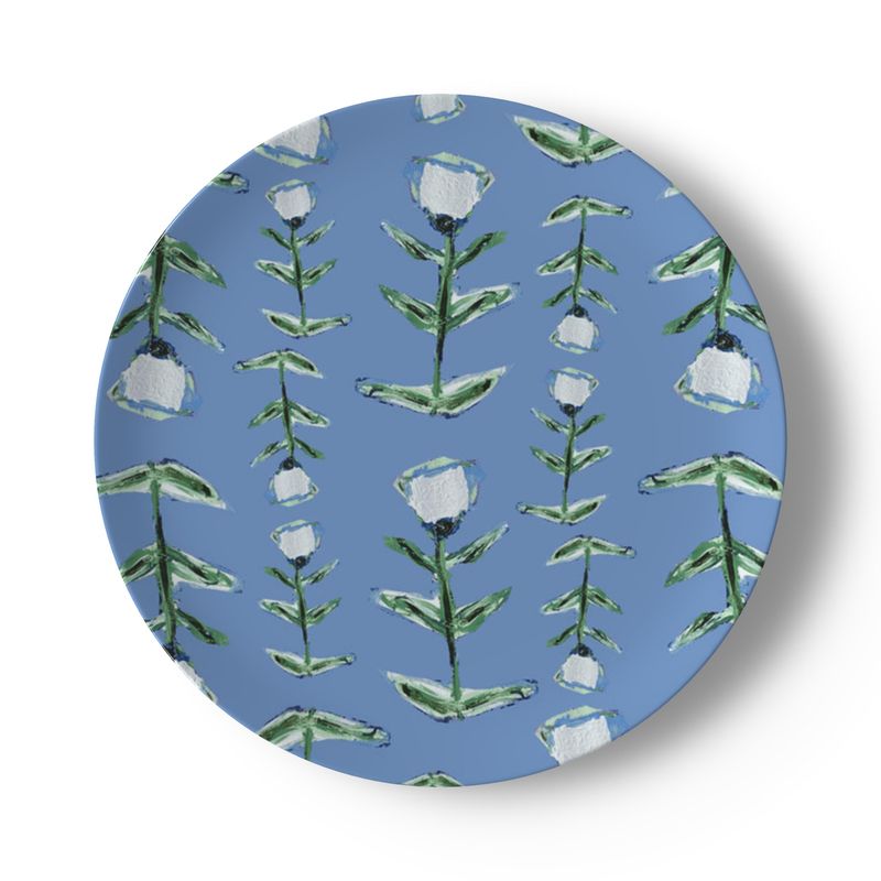 Blue tulip bone china plate by Erin Donahue Tice with green stem tulips on blue background on Tampa Home & Garden Store