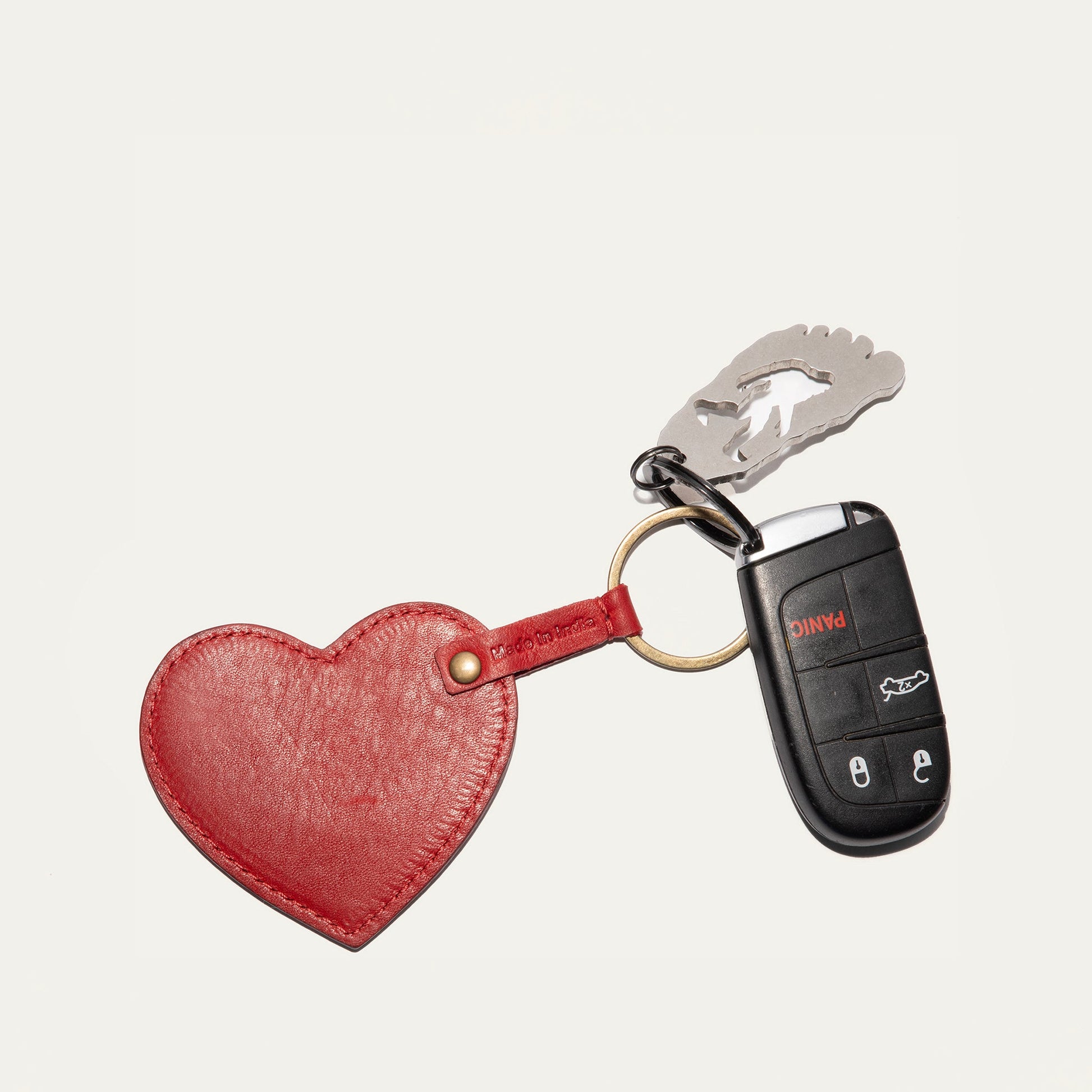 Heart keychain Will Leather Goods, leather heart with metal ring attached to car key fob on Tampa Home & Garden Store