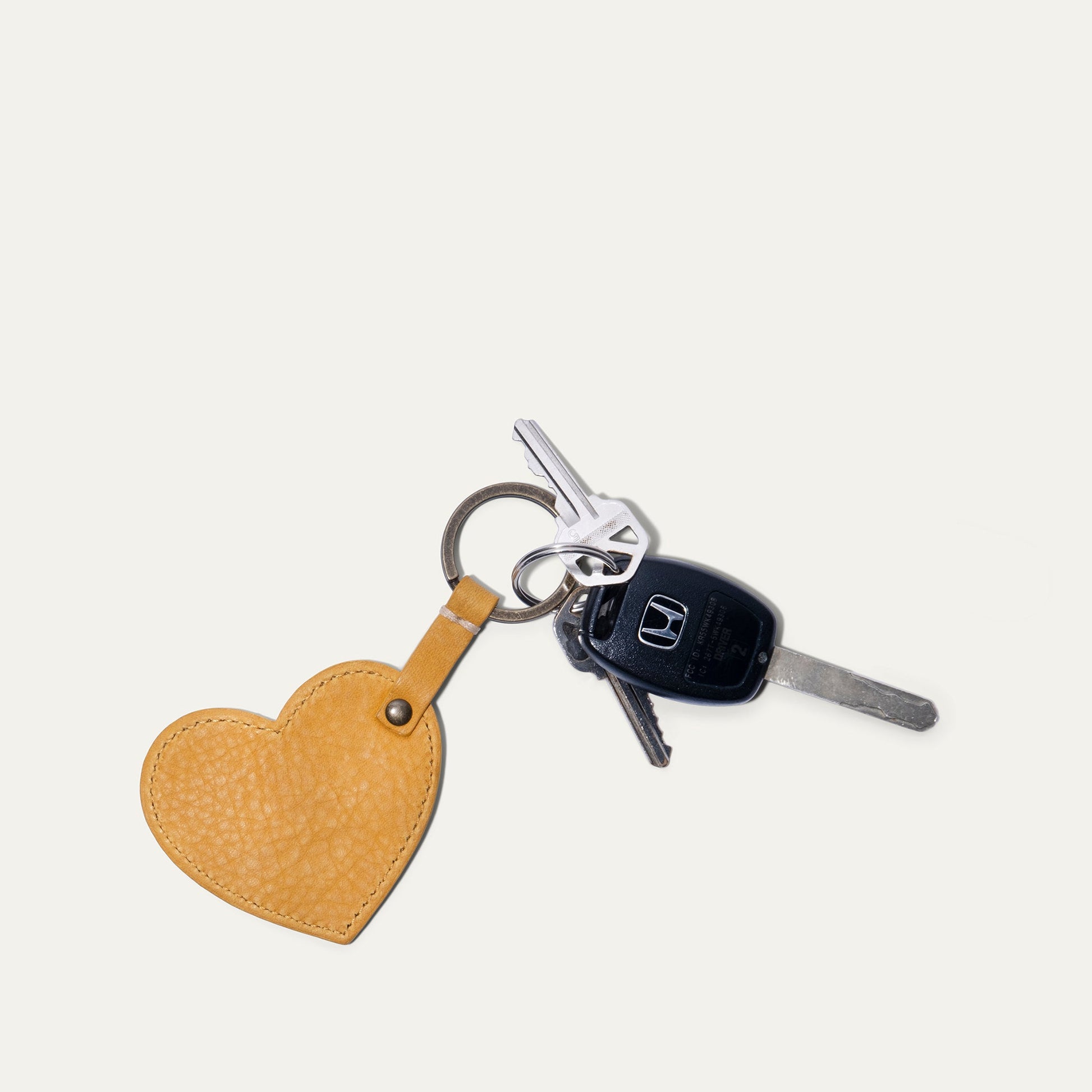 Heart keychain by Will Leather Goods in tan leather with metal ring and attached keys on Tampa Home & Garden Store