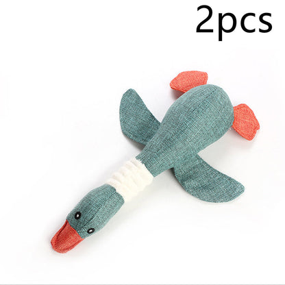 2pcs teal fish-shaped plush dog toys with orange fins and white ribbed midsection on Tampa Home & Garden Store