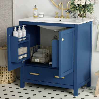 Blue bathroom vanity with undermount sink, two doors and a drawer, white top, gold hardware on Tampa Home & Garden Store