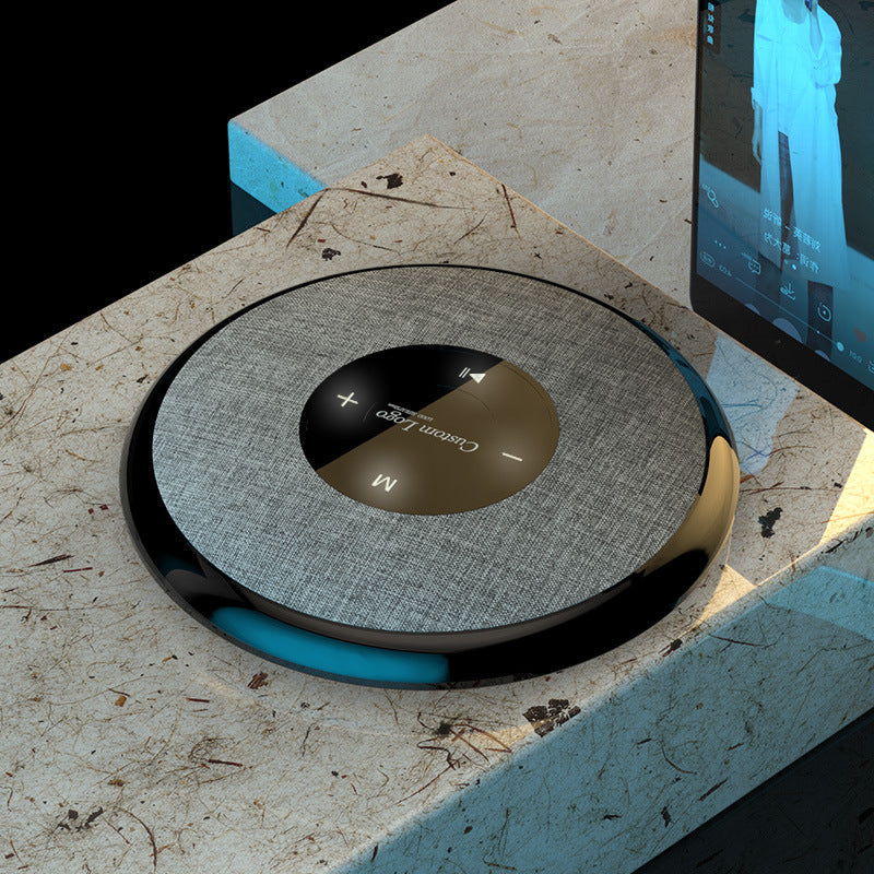 Waterproof Bluetooth speaker by My Store, round gray fabric top with black glossy rim on Tampa Home & Garden Store
