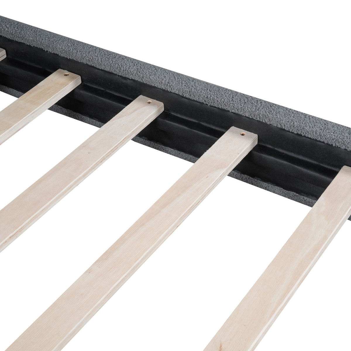 Upholstered platform bed frame with thick rails and curved design, close-up of wooden slats on Tampa Home & Garden Store