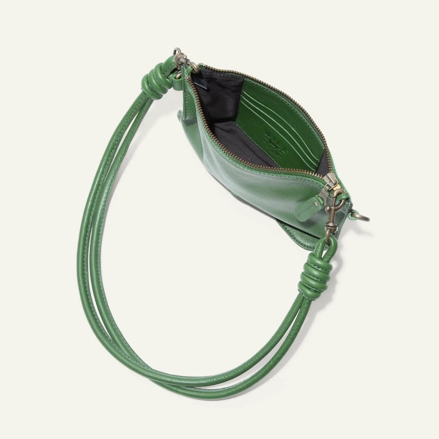 Turin Convertible Zip Pouch green Italian leather with knotted strap and brass zipper on Tampa Home & Garden Store