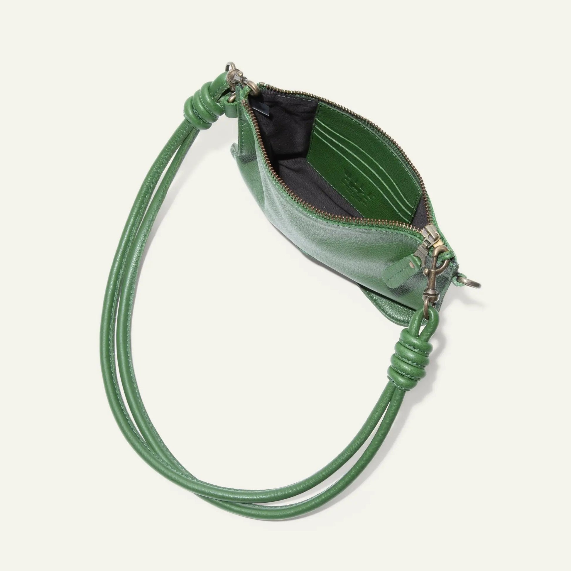 Turin Convertible Zip Pouch green Italian leather with knotted strap and brass zipper on Tampa Home & Garden Store