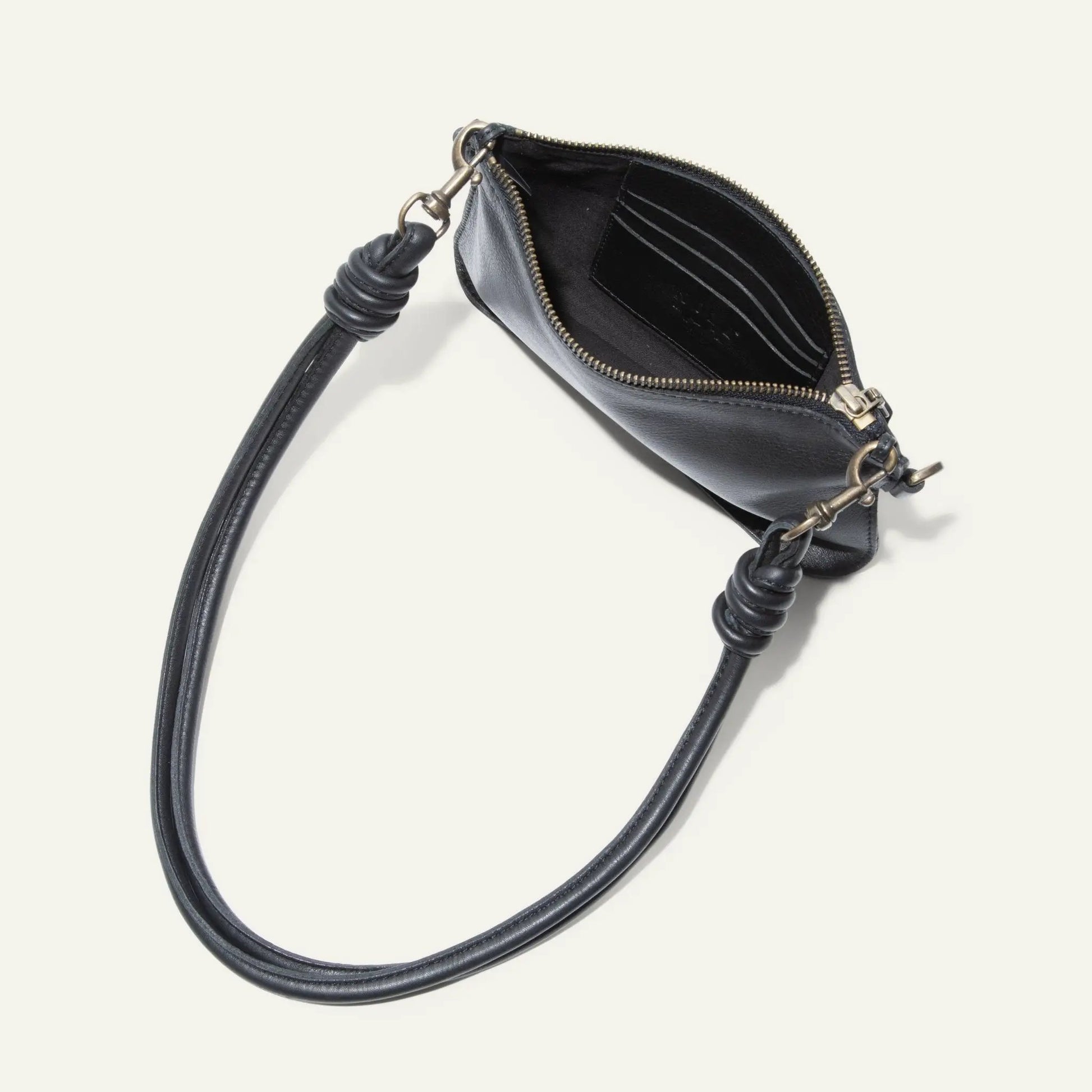 Turin Convertible Zip Pouch Italian Leather in black with card slots and brass zipper on Tampa Home & Garden Store