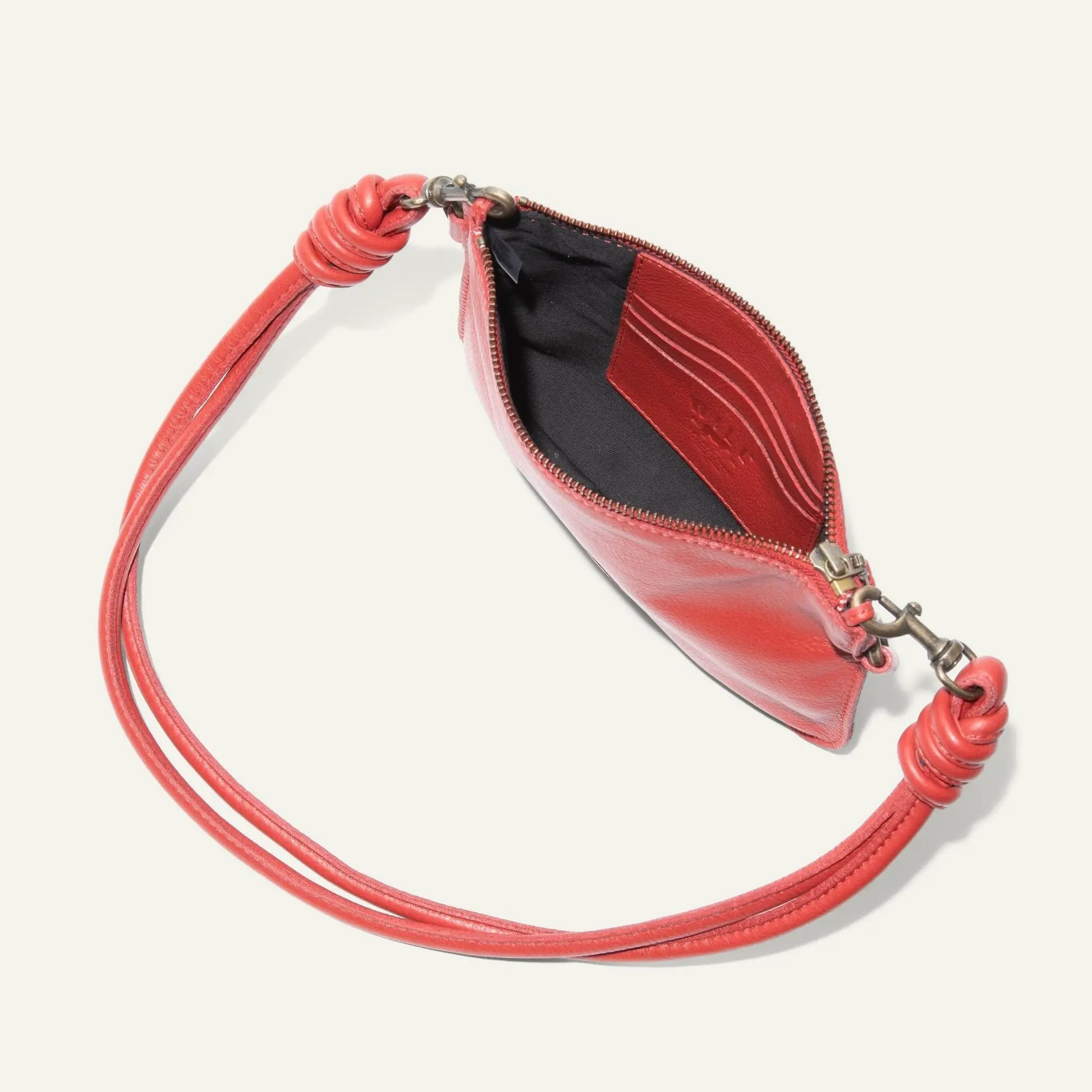 Turin Convertible Zip Pouch Italian Leather red with braided wrist strap and zip closure on Tampa Home & Garden Store