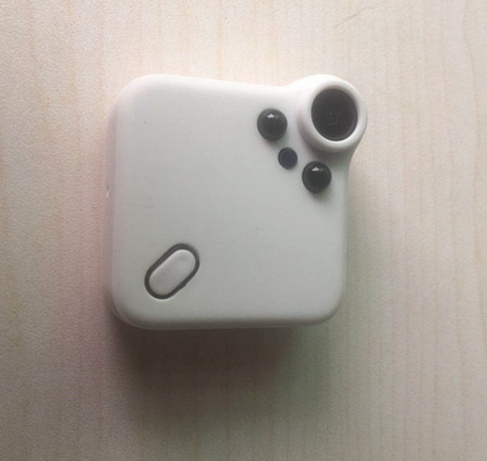 C1S portable sports camera, white with lens at top-right and front control buttons on Tampa Home & Garden Store