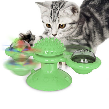 Sucker Turn Windmill Cat Toy green base with spiked hub and three spinning balls Sell My Stuff on Tampa Home & Garden Store
