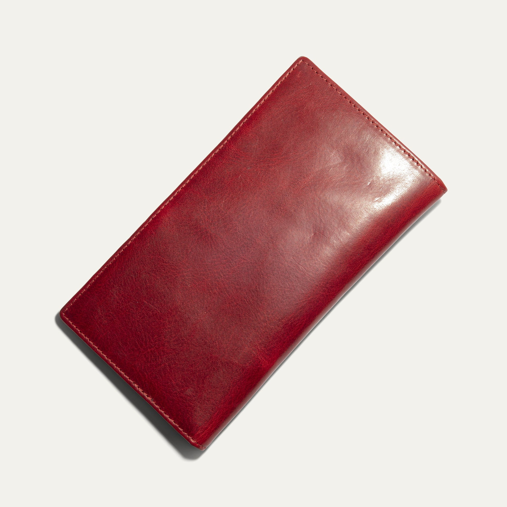 William Pocket Secretary Wallet red leather card case with diagonal corner view on Tampa Home & Garden Store