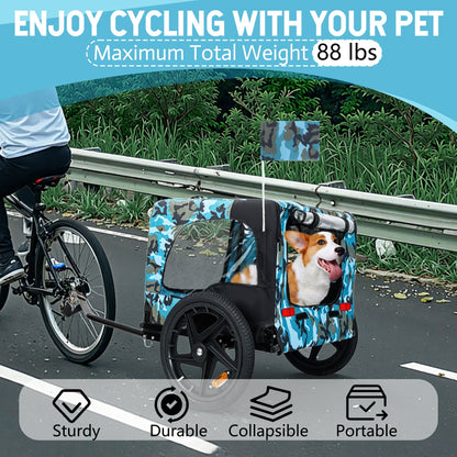Outdoor collapsible pet bike trailer with 16-inch wheels and blue camo fabric with dog inside on Tampa Home & Garden Store