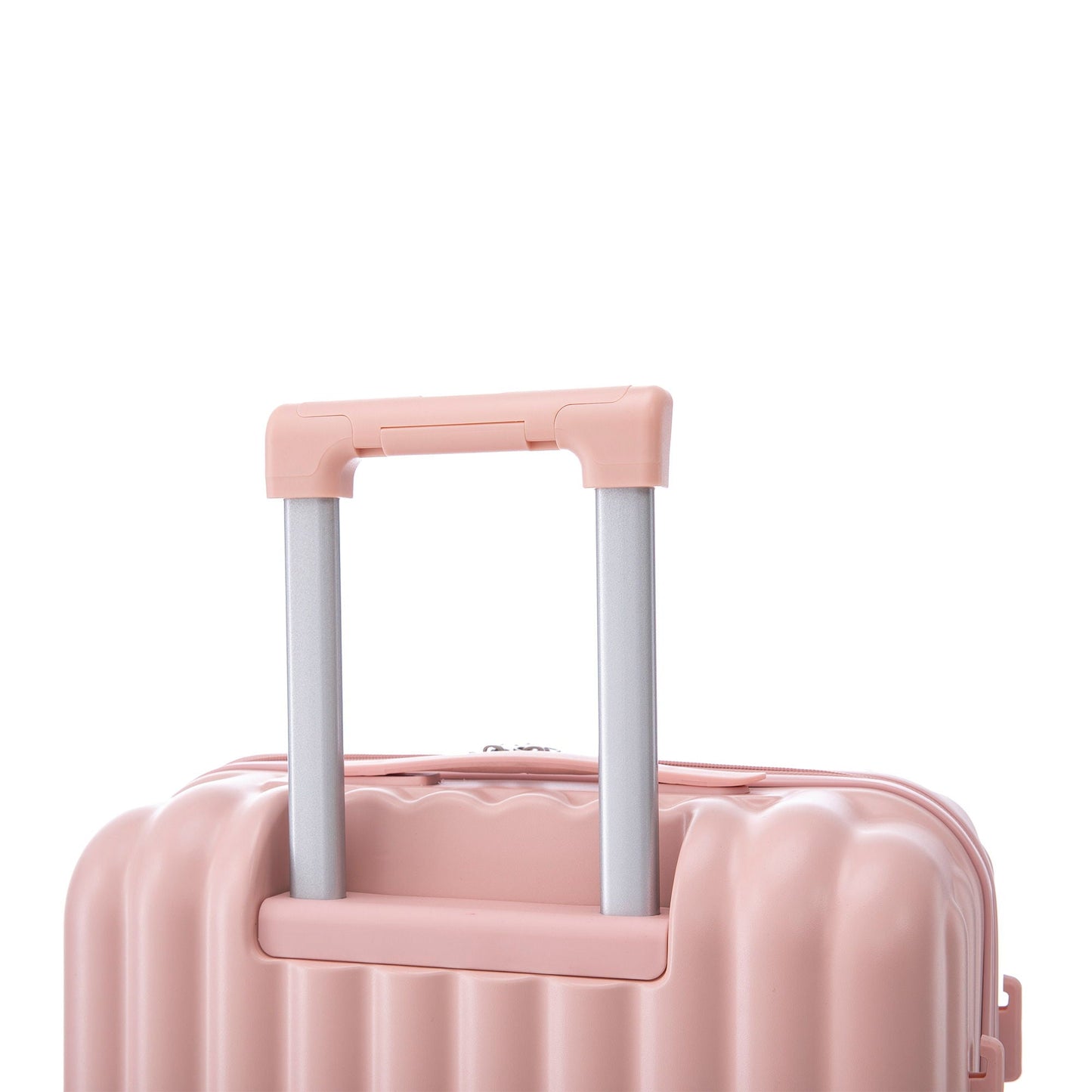 Pink hard-shell spinner luggage with silver telescoping handles and ribbed surface on Tampa Home & Garden Store