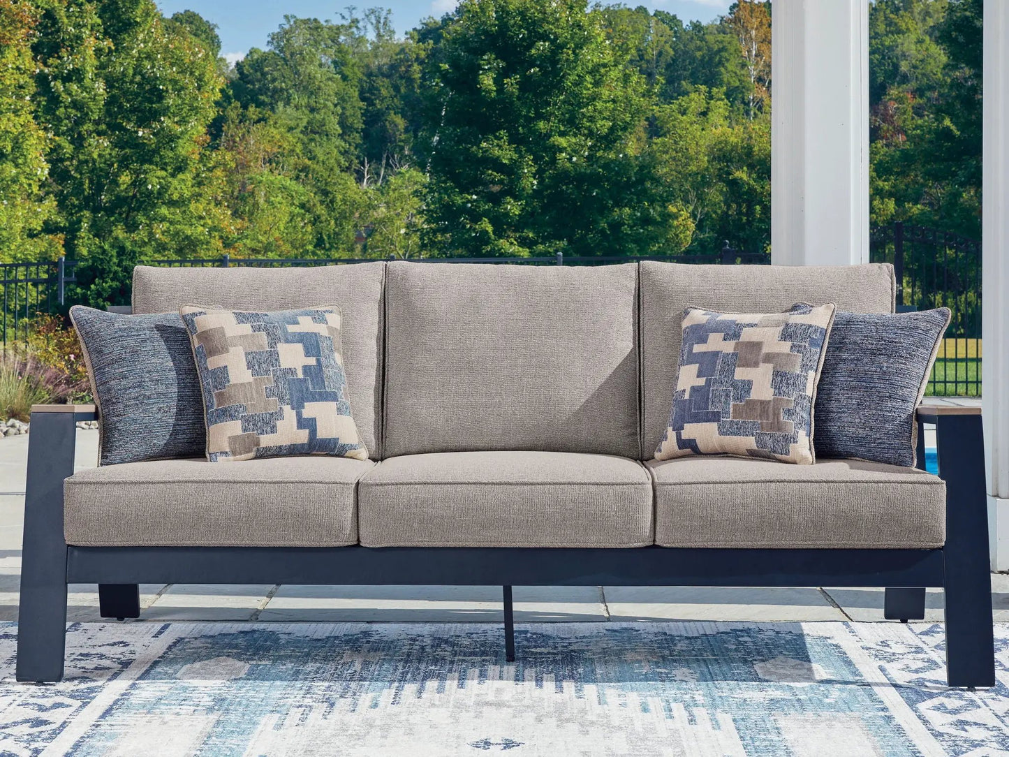 East Beach outdoor sofa with gray-blue upholstery and geometric blue-beige cushions on Tampa Home & Garden Store