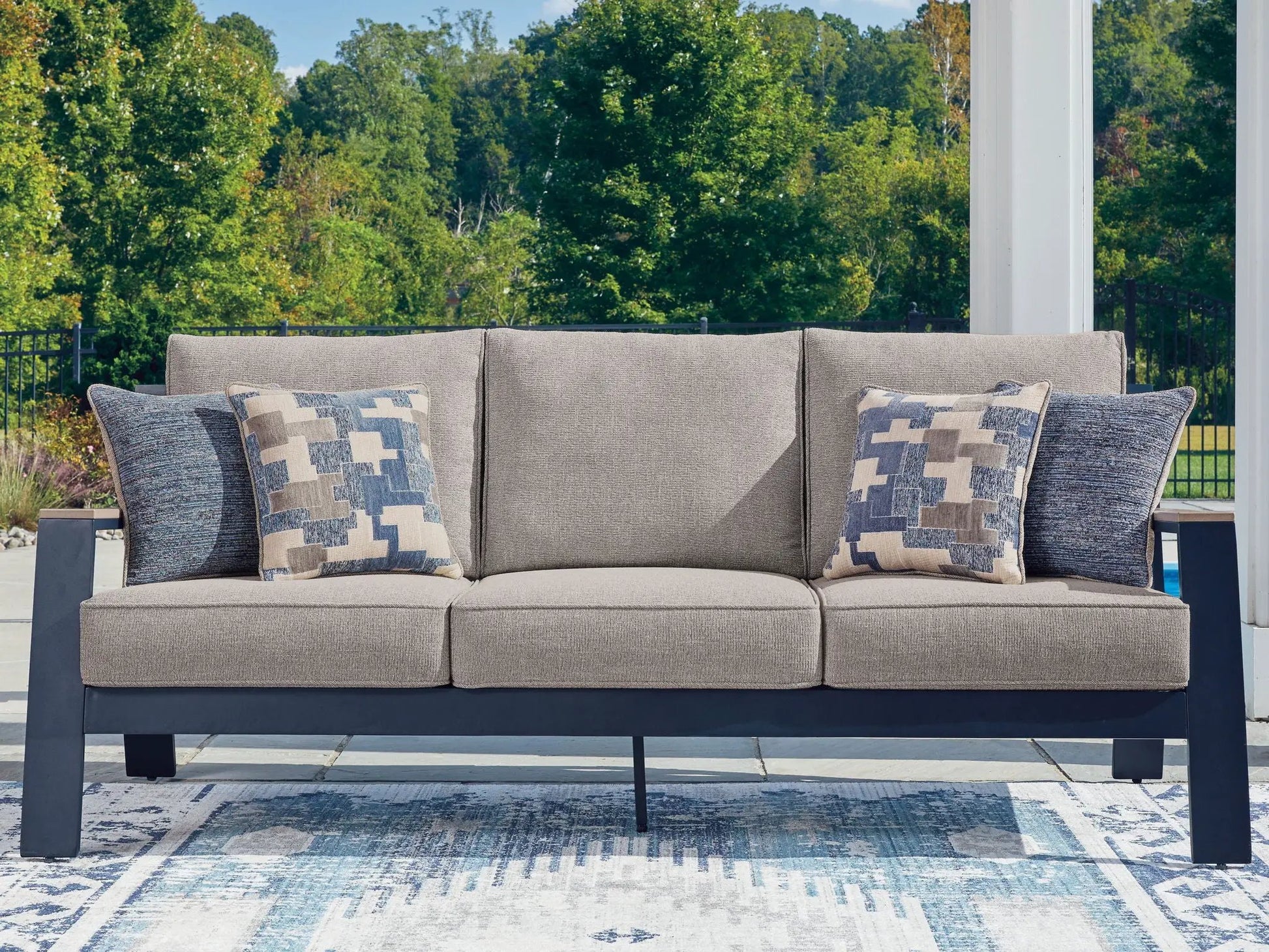 East Beach outdoor sofa with gray-blue upholstery and geometric blue-beige cushions on Tampa Home & Garden Store