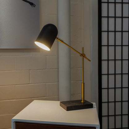 Lumora table lamp black shade with brass arm on white desk by HouseOfZazla on Tampa Home & Garden Store
