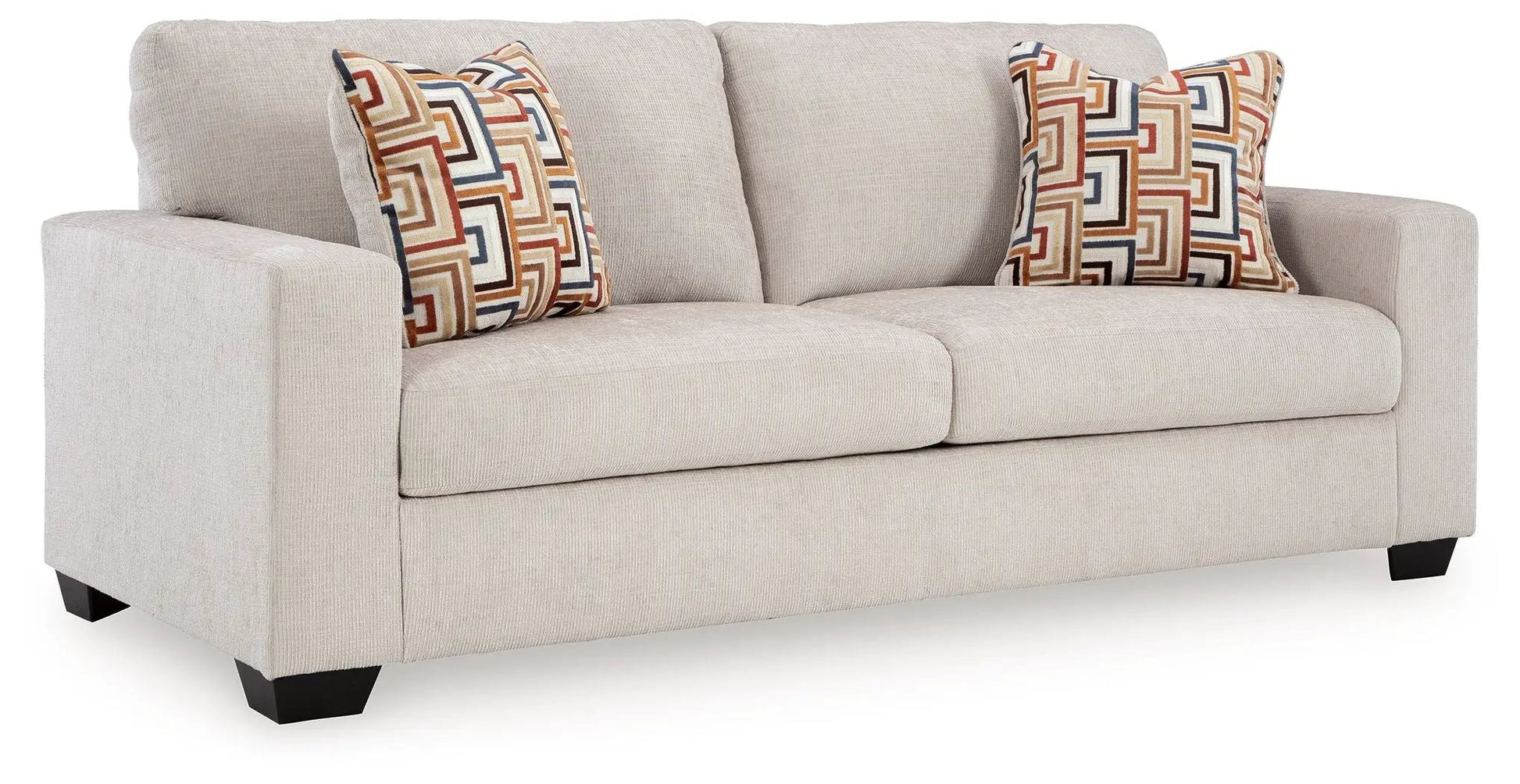 Aviemore Sofa Sleeper by Unique Piece Furniture in tan fabric with two geometric throw pillows on Tampa Home & Garden Store