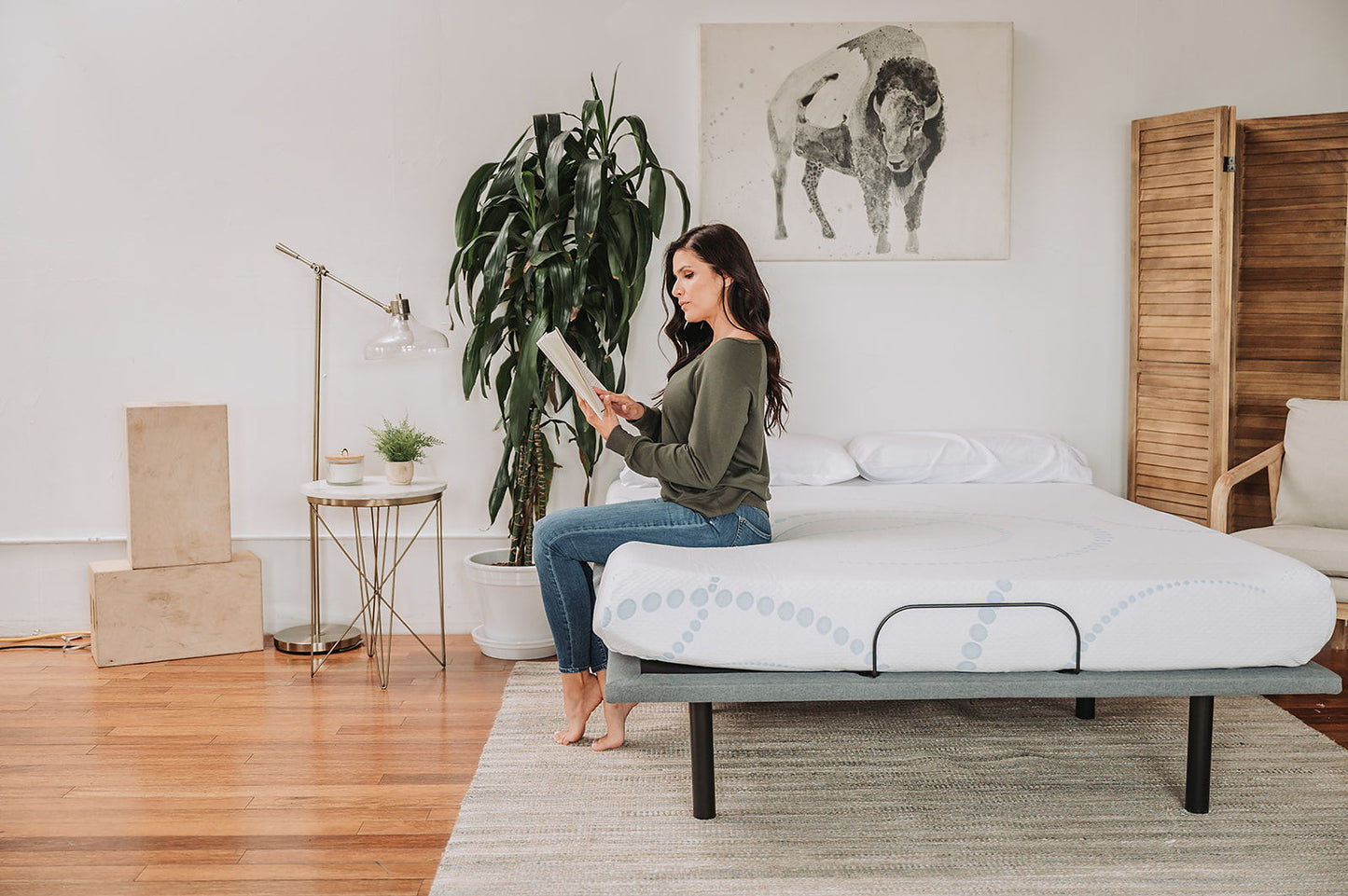 HouseOfZazla 8-inch Memory Foam Mattress in a white bedroom with a woman reading on bed on Tampa Home & Garden Store
