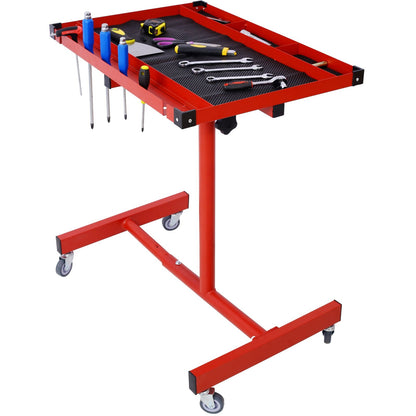 Adjustable tear-down work table with red metal frame and mobile casters on Tampa Home & Garden Store