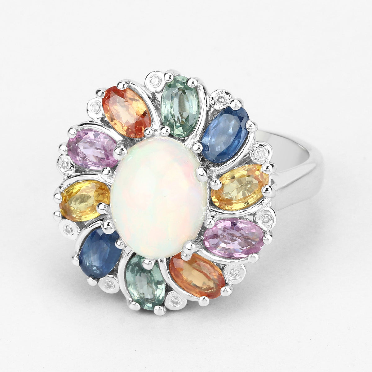 Ring with 3.92ct Ethiopian opal center surrounded by sapphires and diamonds in sterling silver on Tampa Home & Garden Store