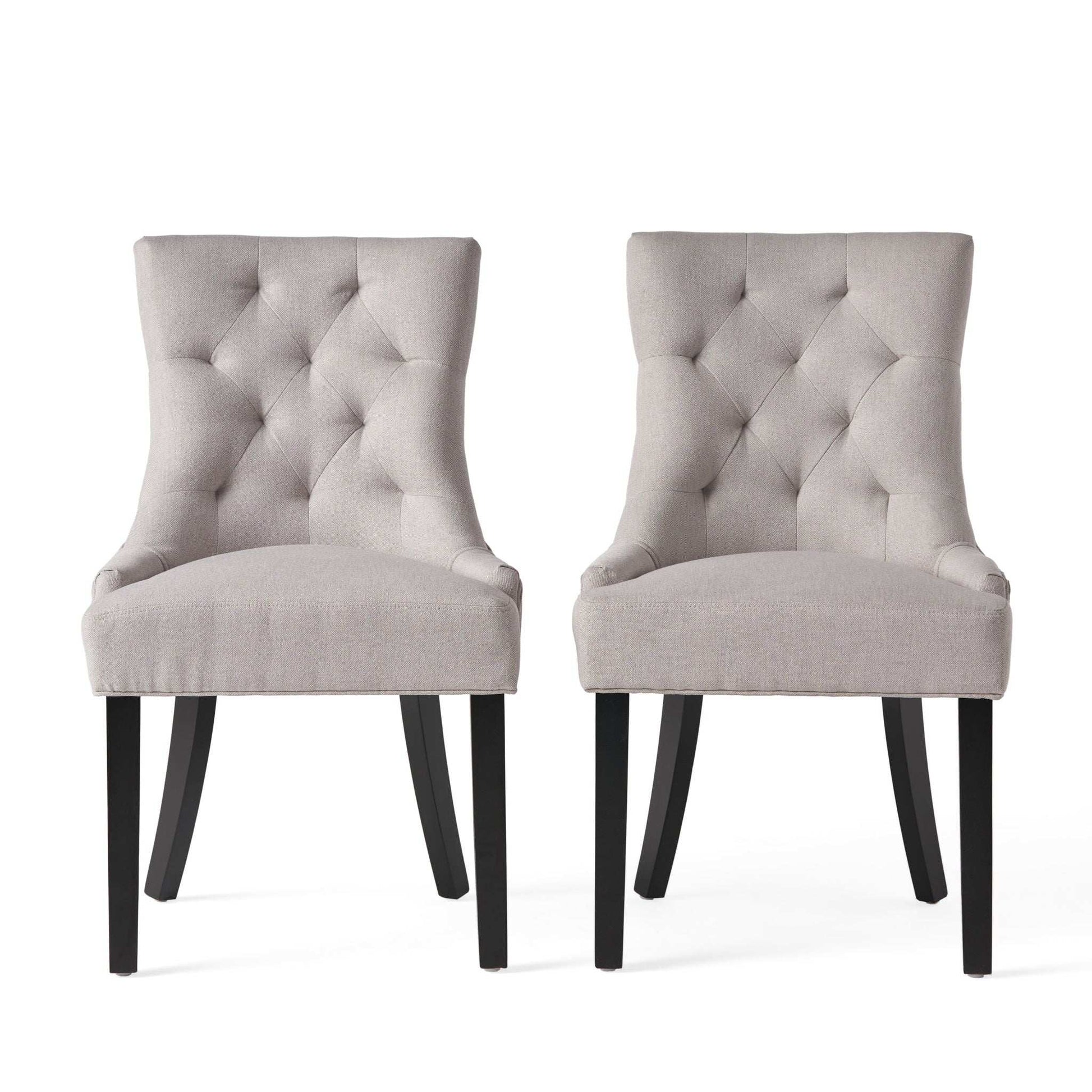 Contemporary Cheney dining chair set with tufted beige fabric and black legs, pair on Tampa Home & Garden Store