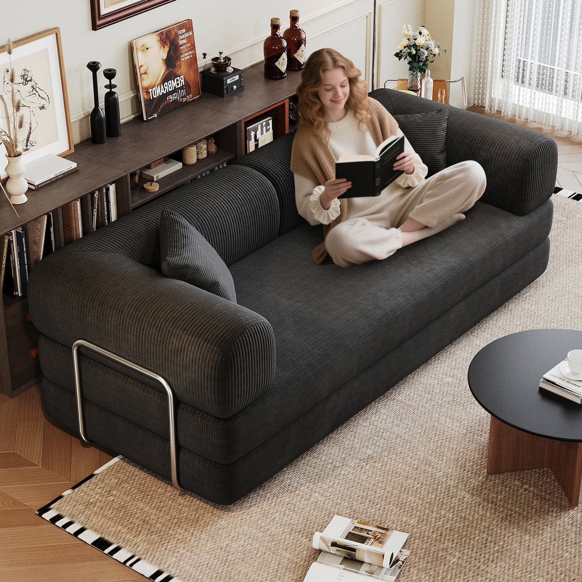 Corduroy compression sofa in dark gray with pillow-back in living room on Tampa Home & Garden Store