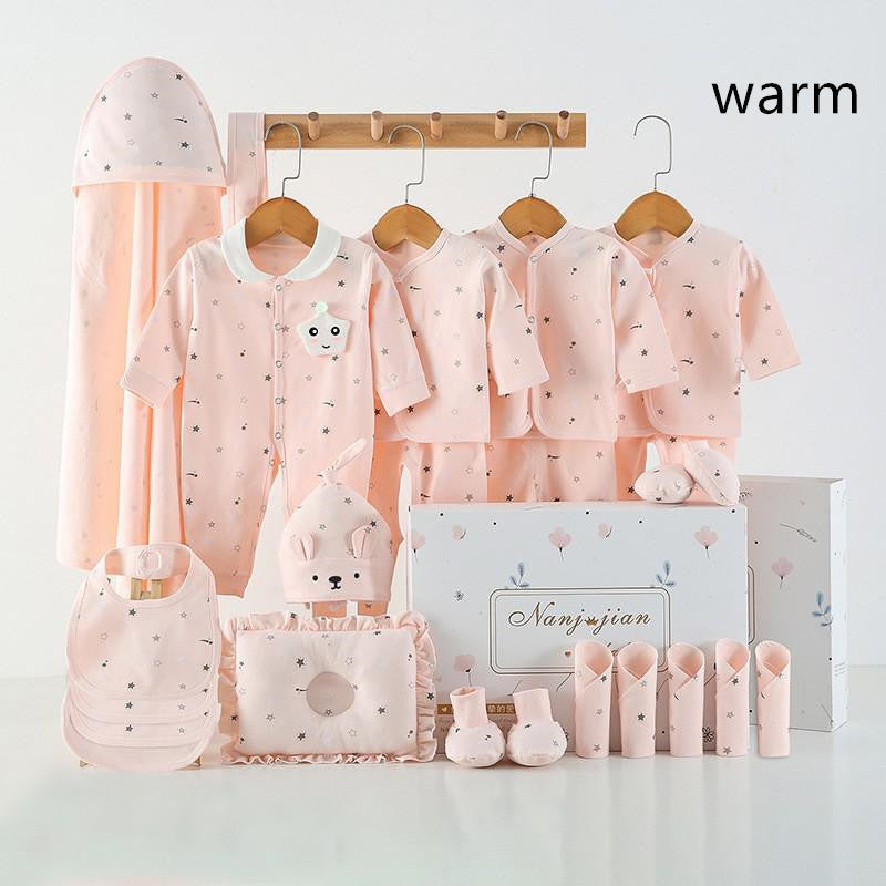 Newborn baby clothes gift box set in pink star pattern with onesies, hat, bib and booties on Tampa Home & Garden Store