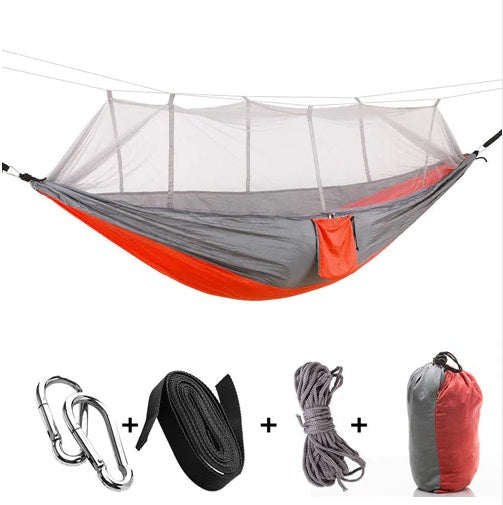 Army green parachute hammock with mosquito net, includes 2 carabiners, straps, rope, bag on Tampa Home & Garden Store