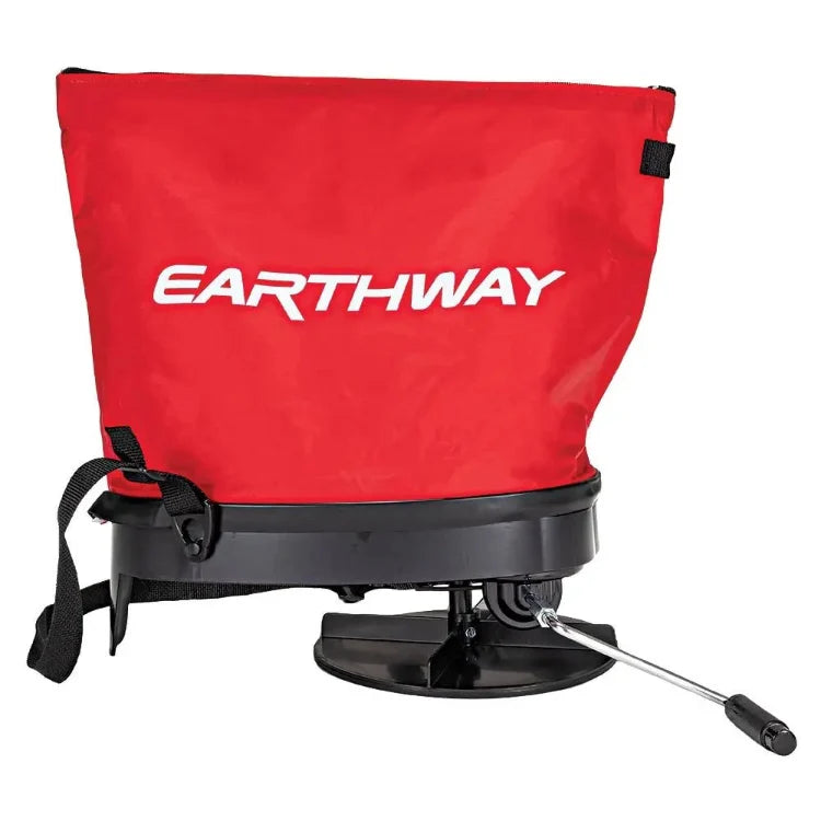 Earthway Over Shoulder Bag Spreader with red bag, black base, and shoulder strap on Tampa Home & Garden Store