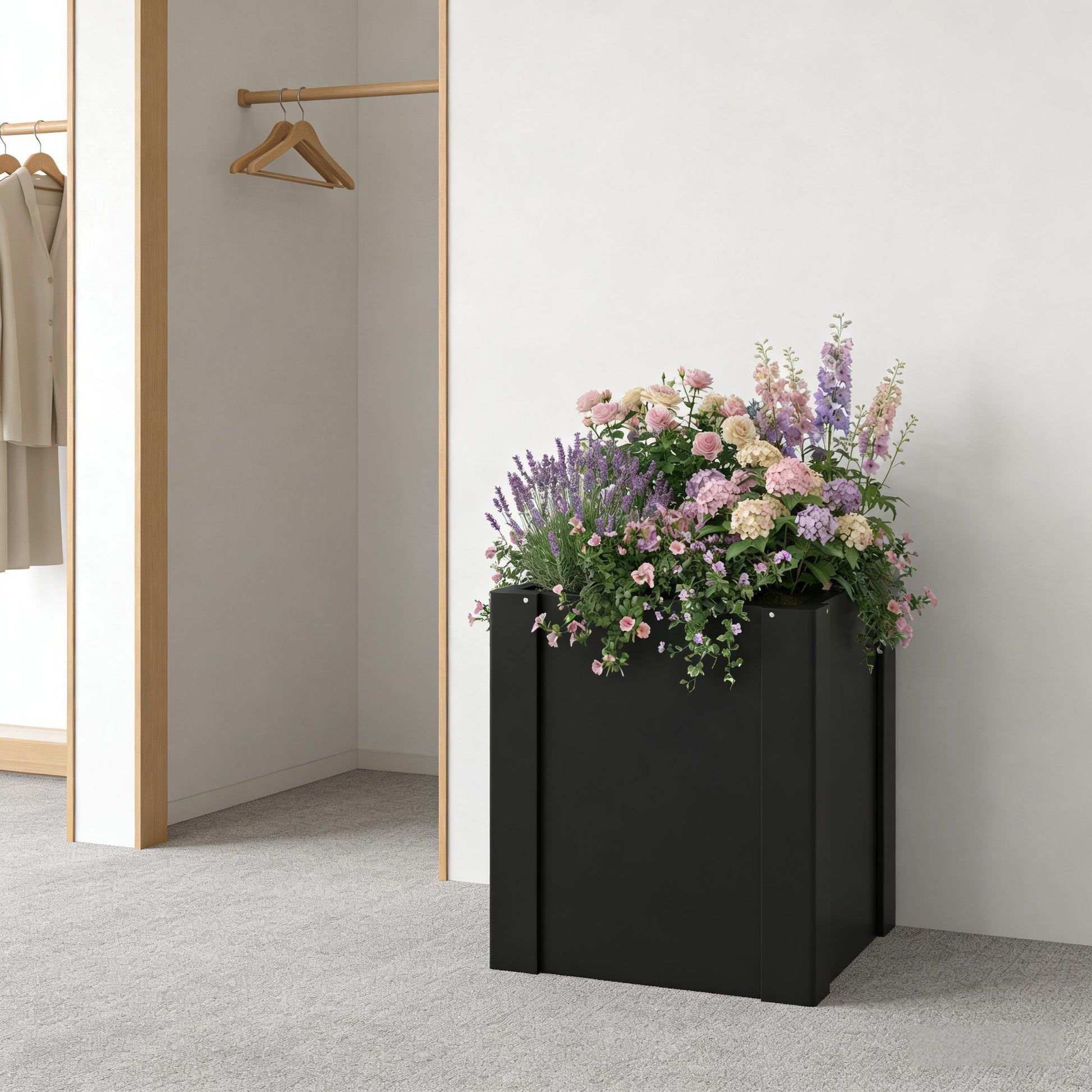 Modern Planter Bed elevated black planter with lush pink and purple flowers on Tampa Home & Garden Store