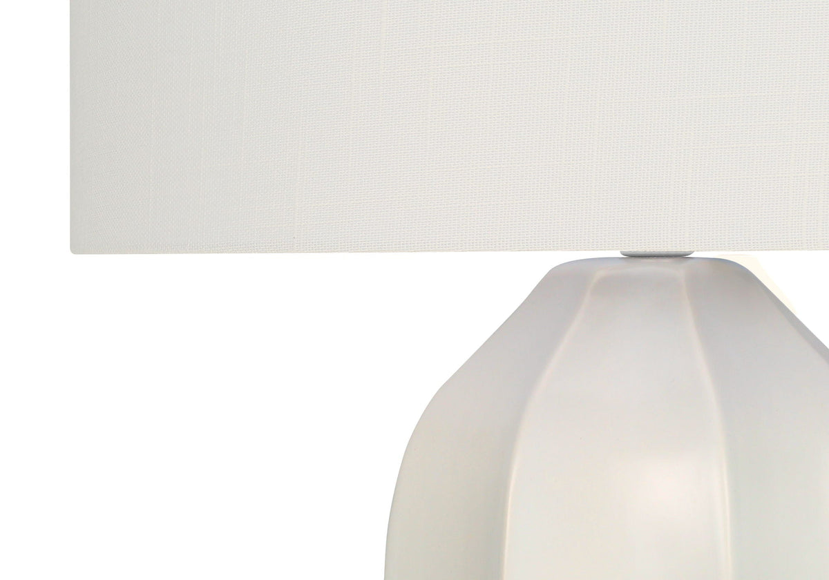 Table lamp cream ceramic base with faceted silhouette and cream shade on Tampa Home & Garden Store