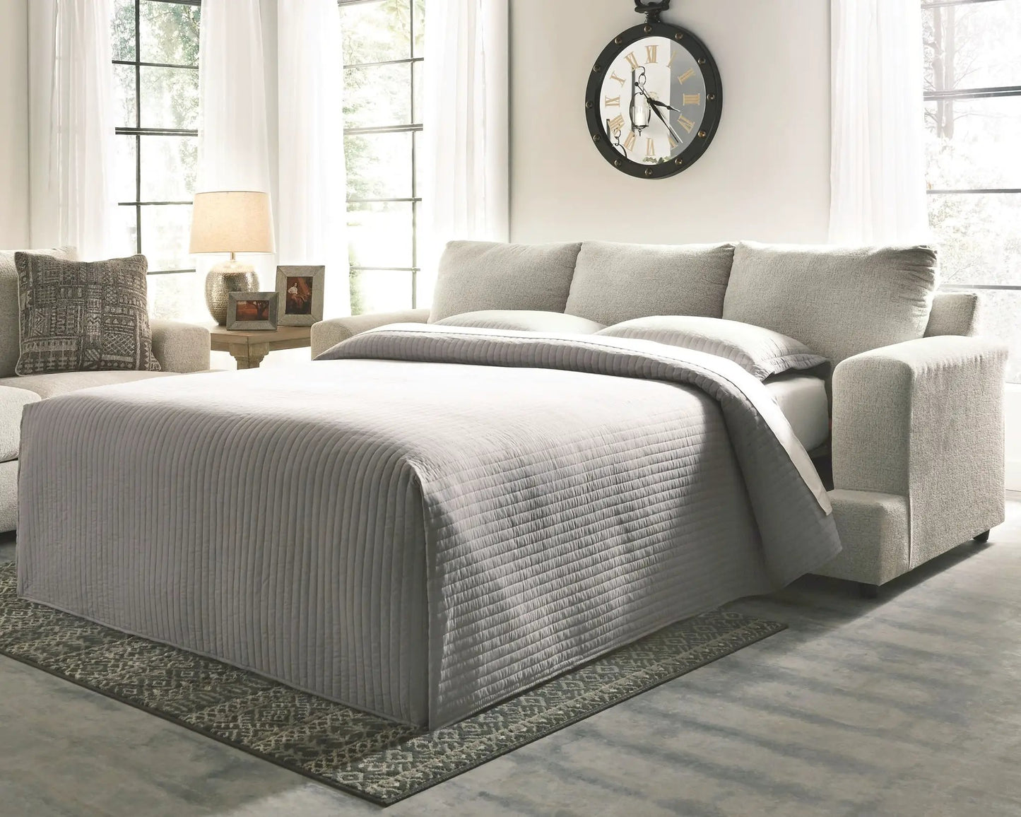 Soletren Sleeper Sofa by Unique Piece Furniture in gray quilted fabric, modern living room on Tampa Home & Garden Store