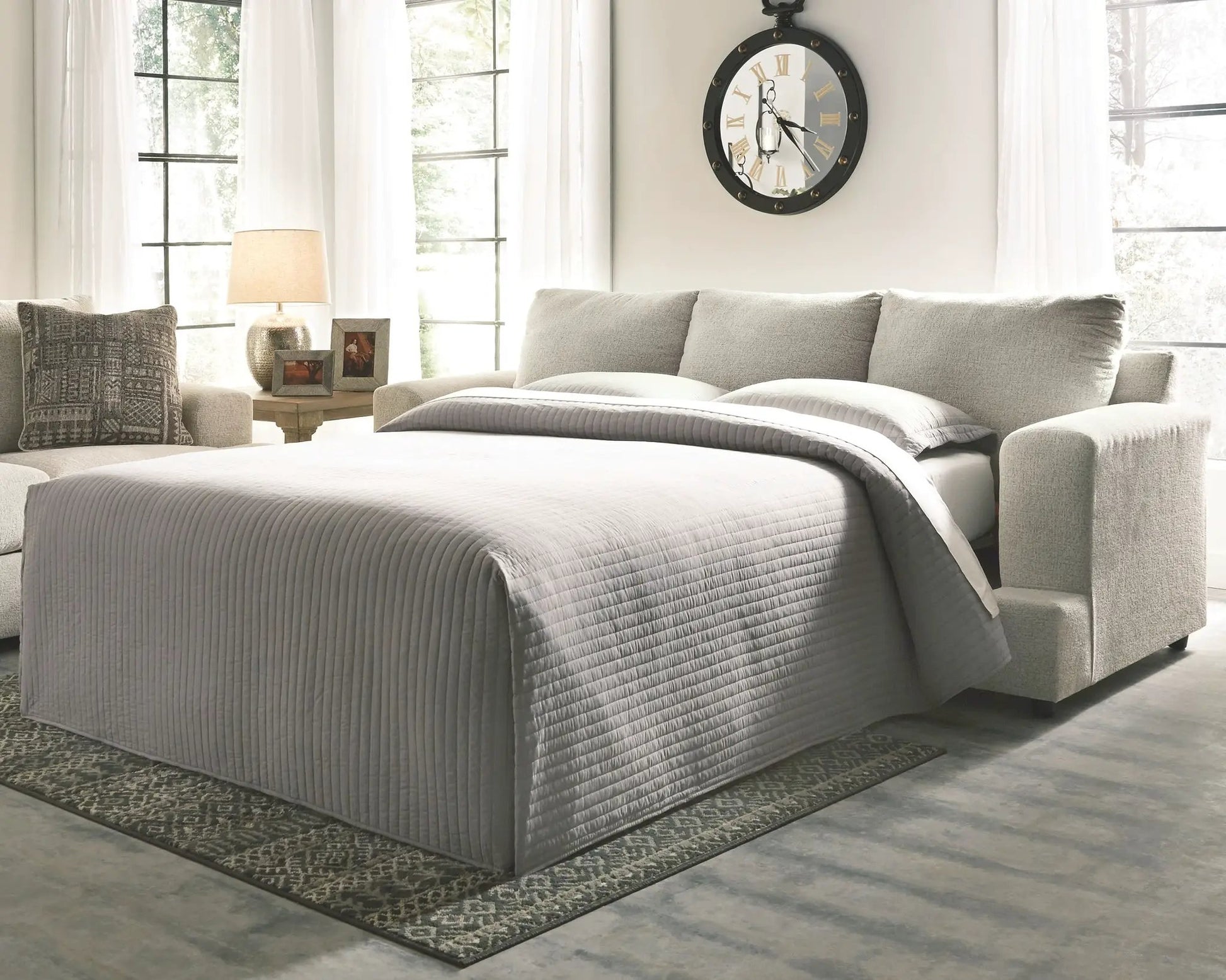 Soletren Sleeper Sofa by Unique Piece Furniture in gray quilted fabric, modern living room on Tampa Home & Garden Store