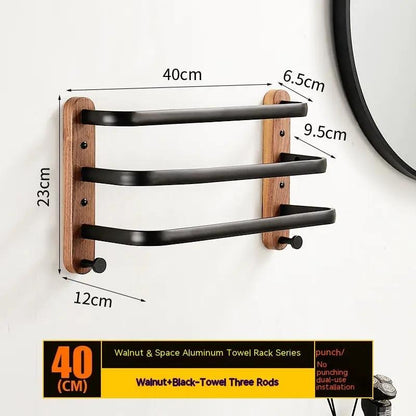 Solid wood wall-mounted towel rack with three curved black metal bars and walnut backplates on Tampa Home & Garden Store