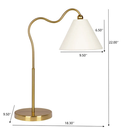 Ornate ring-base curved table lamp in gold with white triangle drum shade on Tampa Home & Garden Store