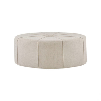 Beige round cocktail ottoman by HouseOfZazla, upholstered with stitched panel top on Tampa Home & Garden Store