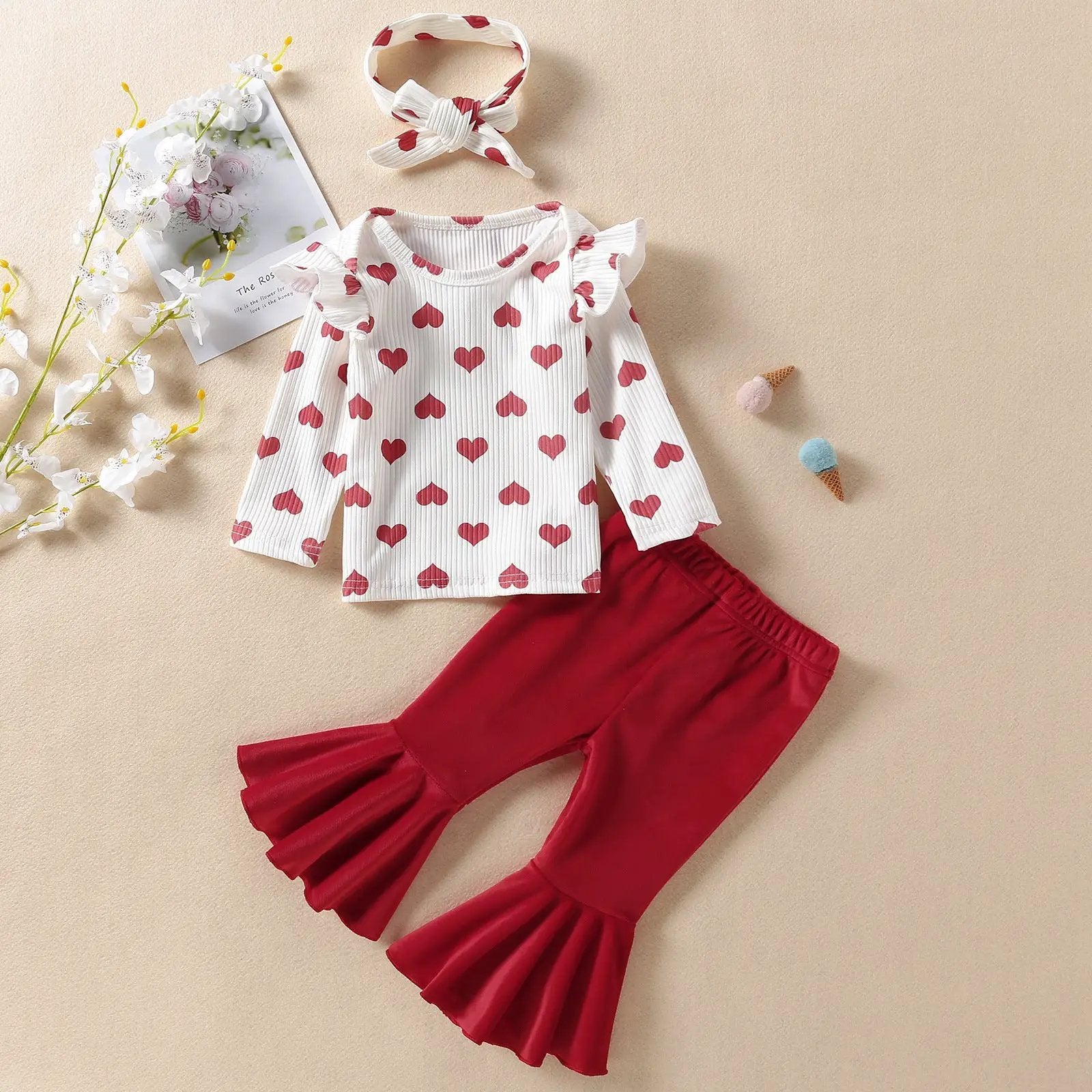 Infant love top two-piece set: white ribbed top with red hearts and red flared pants on Tampa Home & Garden Store