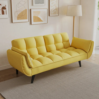 Yellow tufted sofa with two armrests and dark legs in a bright living room on Tampa Home & Garden Store