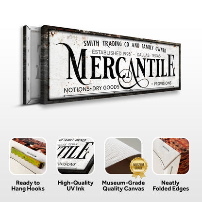 Mercantile Sign canvas with rustic white surface and bold black lettering in aged metal frame on Tampa Home & Garden Store