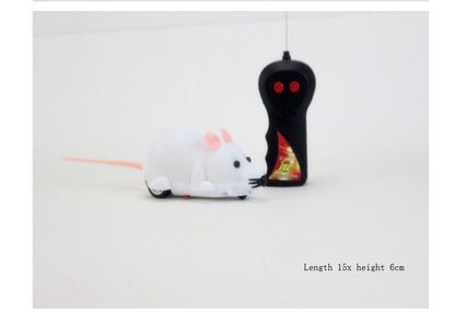 RC mouse toy with white flocking, pink ears, and black remote transmitter by Sell My Stuff on Tampa Home & Garden Store