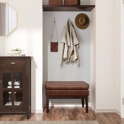 Carlson Ottoman Bench mid-century design with dark wood legs and brown leather cushion on Tampa Home & Garden Store