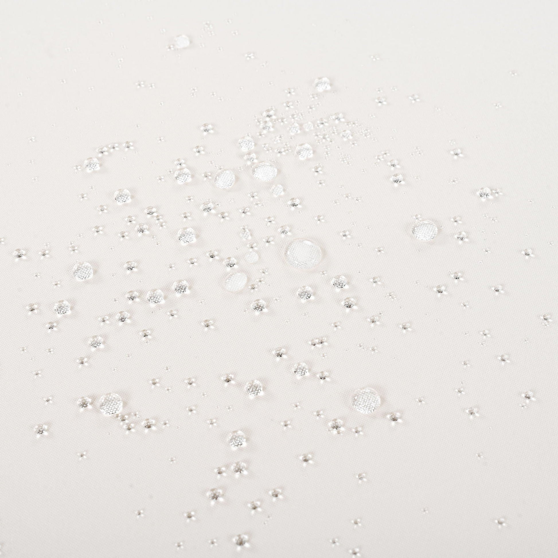 Outdoor sunlounger fabric closeup with dew droplets on white textile, HouseOfZazla on Tampa Home & Garden Store