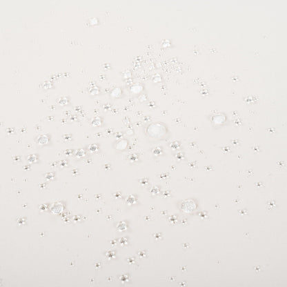 Outdoor sunlounger fabric closeup with dew droplets on white textile, HouseOfZazla on Tampa Home & Garden Store