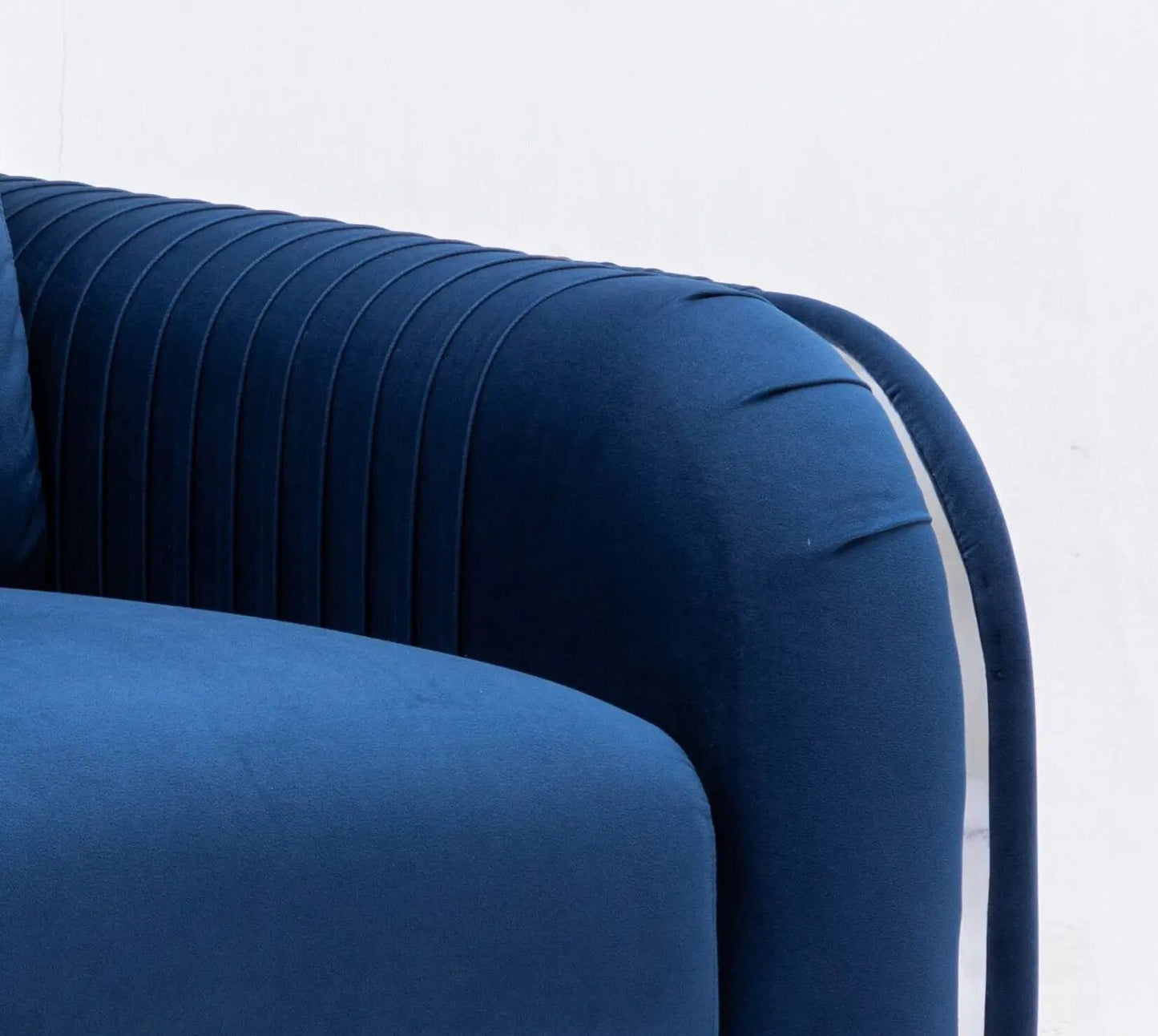 Wenona Modern Elegance Sofa blue velvet sofa with vertical channel stitching on curved arms on Tampa Home & Garden Store
