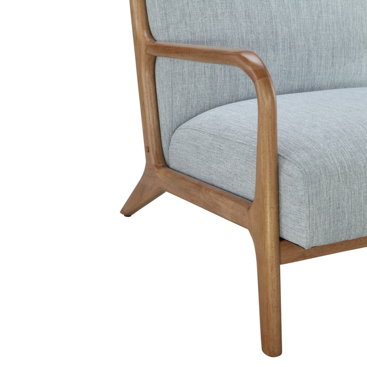 Mid-Century style lounge chair with light blue upholstery and curved wooden arms on Tampa Home & Garden Store