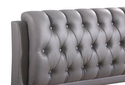 Tufted upholstered bed headboard in gray faux leather with deep button tufting on Tampa Home & Garden Store